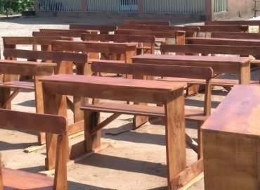 Thank You Partners – More Kids now have chairs to sit on at Onyeke Secondary School
