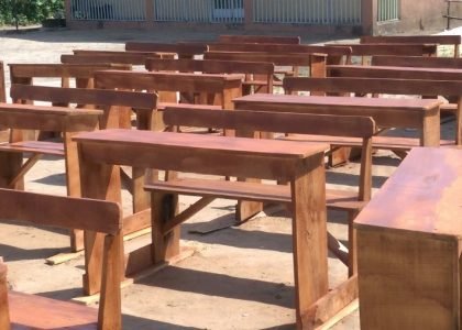 Thank You Partners – More Kids now have chairs to sit on at Onyeke Secondary School